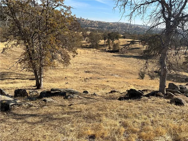 a view of a lake with a house in the background