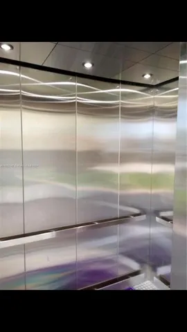 a bathroom with a sink toilet and mirror