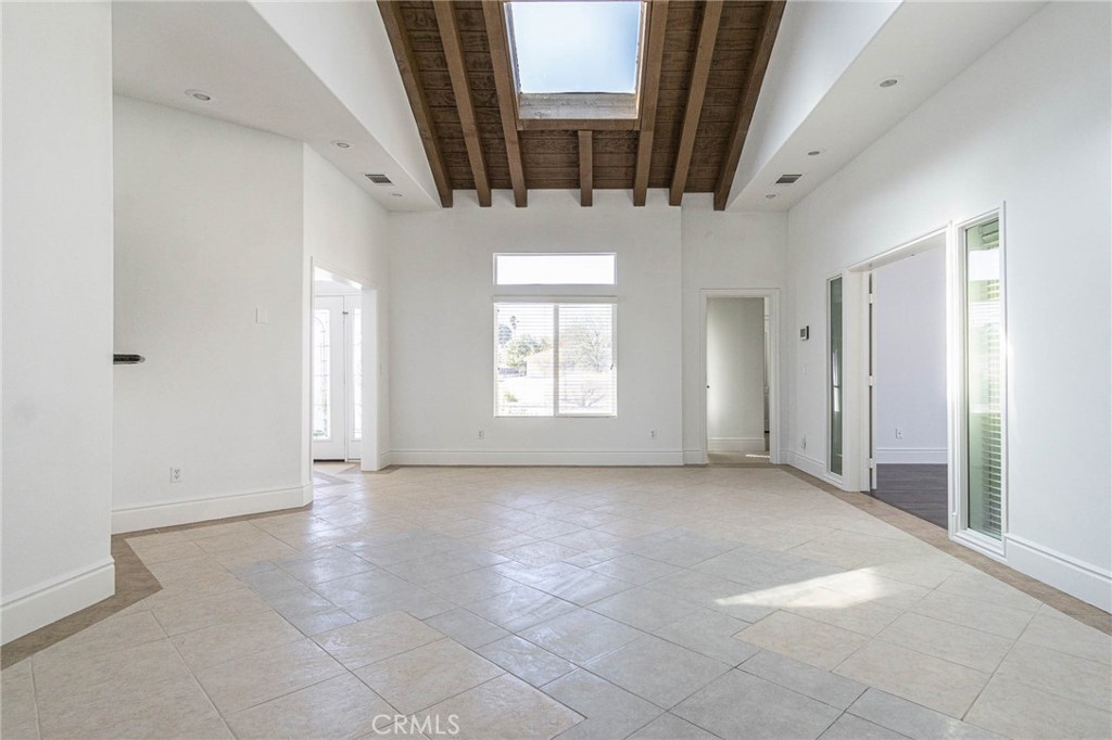 16233 Ridge View Drive Apple Valley, CA 92307 - Photo 34 of 50 a view of a livingroom with an empty space and window