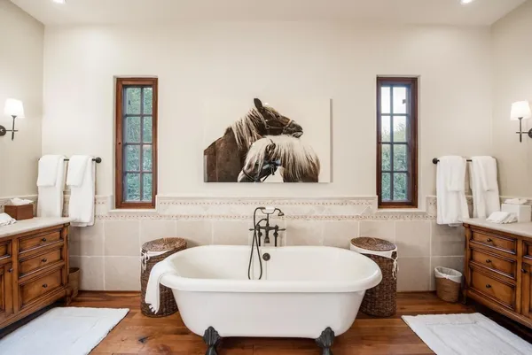a bathroom with a bathtub and a sink