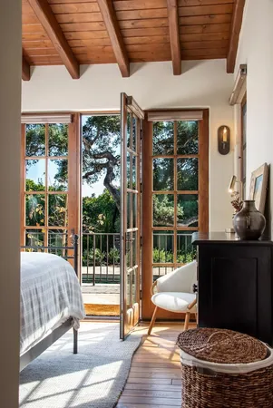 a living room with large windows