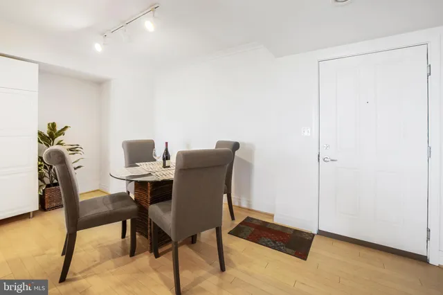 a workspace with furniture and wooden floor