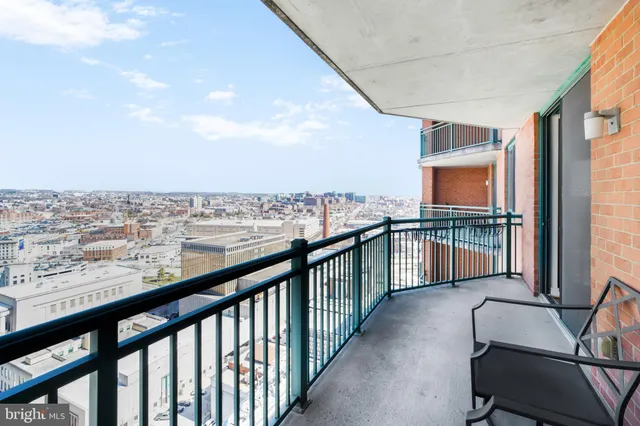 a view of balcony with furniture