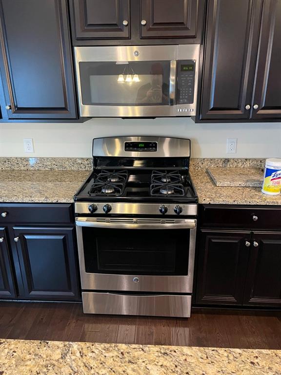 617 Broadmore Lane Wexford, PA 15090 - Photo 17 of 36 a stove top oven sitting inside of a kitchen