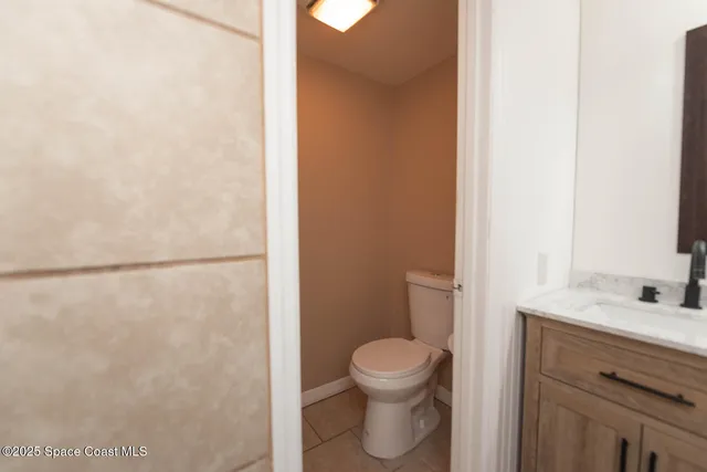 a bathroom with a double vanity sink mirror and shower