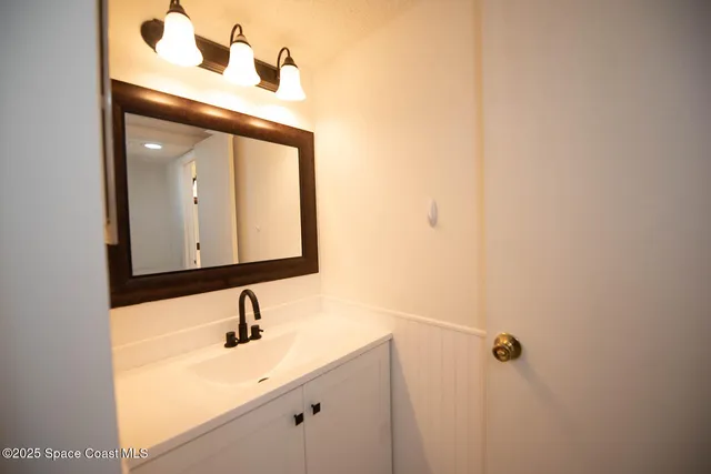 a bathroom with a bathtub and a toilet