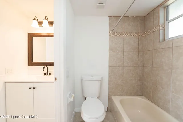 a view of a bathroom with a sink