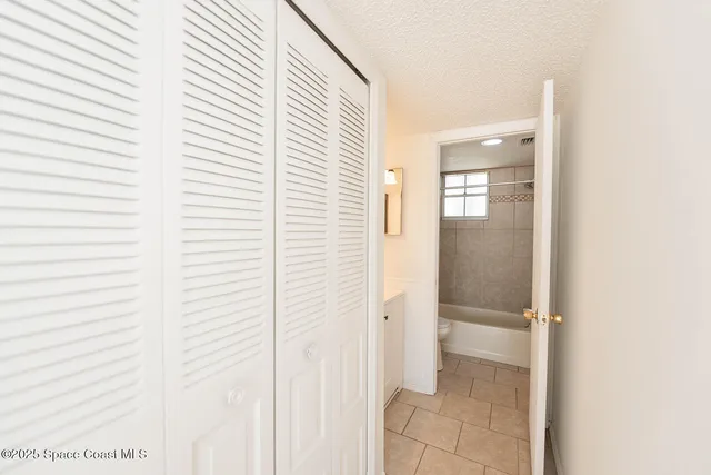 a view of a room that has a window in it