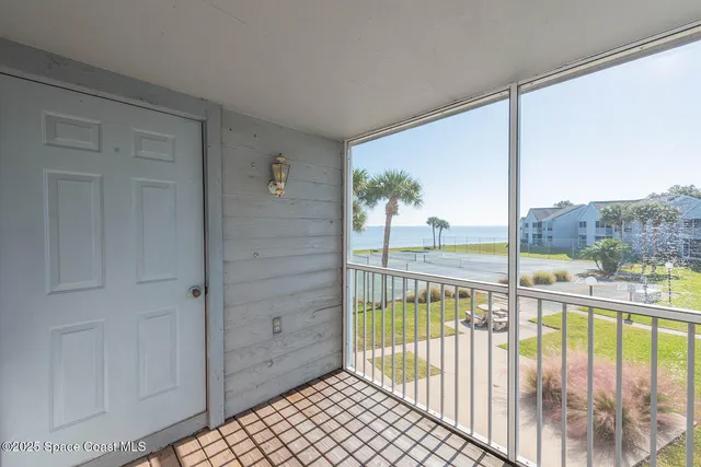 a view of a balcony with lake view and a balcony