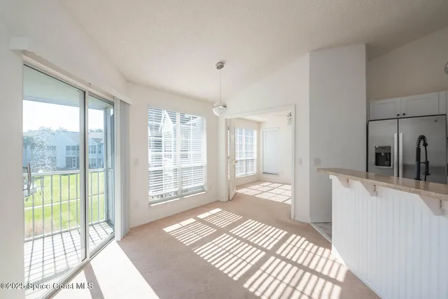 a kitchen with a sink and a window