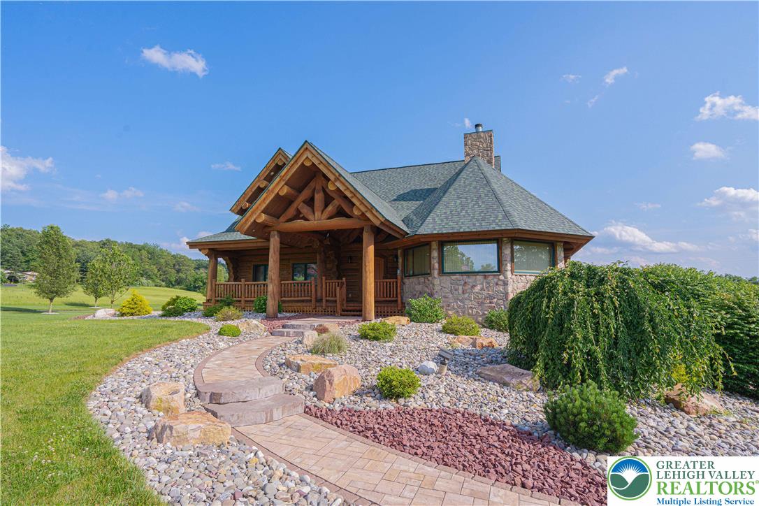 379 Meyer Road Nazareth, PA 18064 - Photo 15 of 78 a front view of a house with garden
