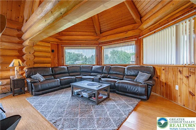 a kitchen with stainless steel appliances granite countertop a stove and a microwave