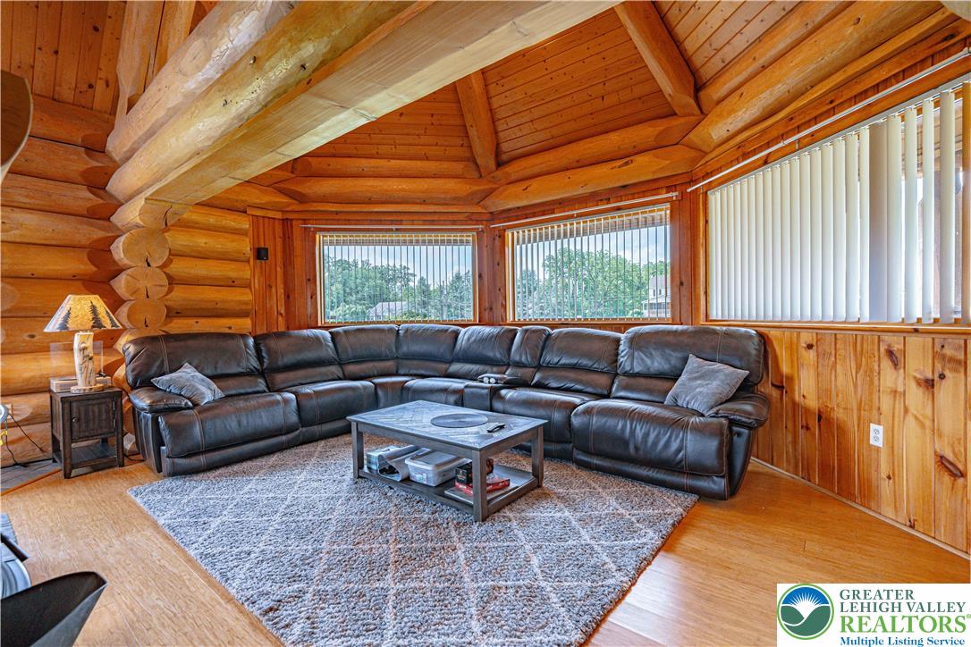 379 Meyer Road Nazareth, PA 18064 - Photo 24 of 78 a living room with furniture a rug and a large window