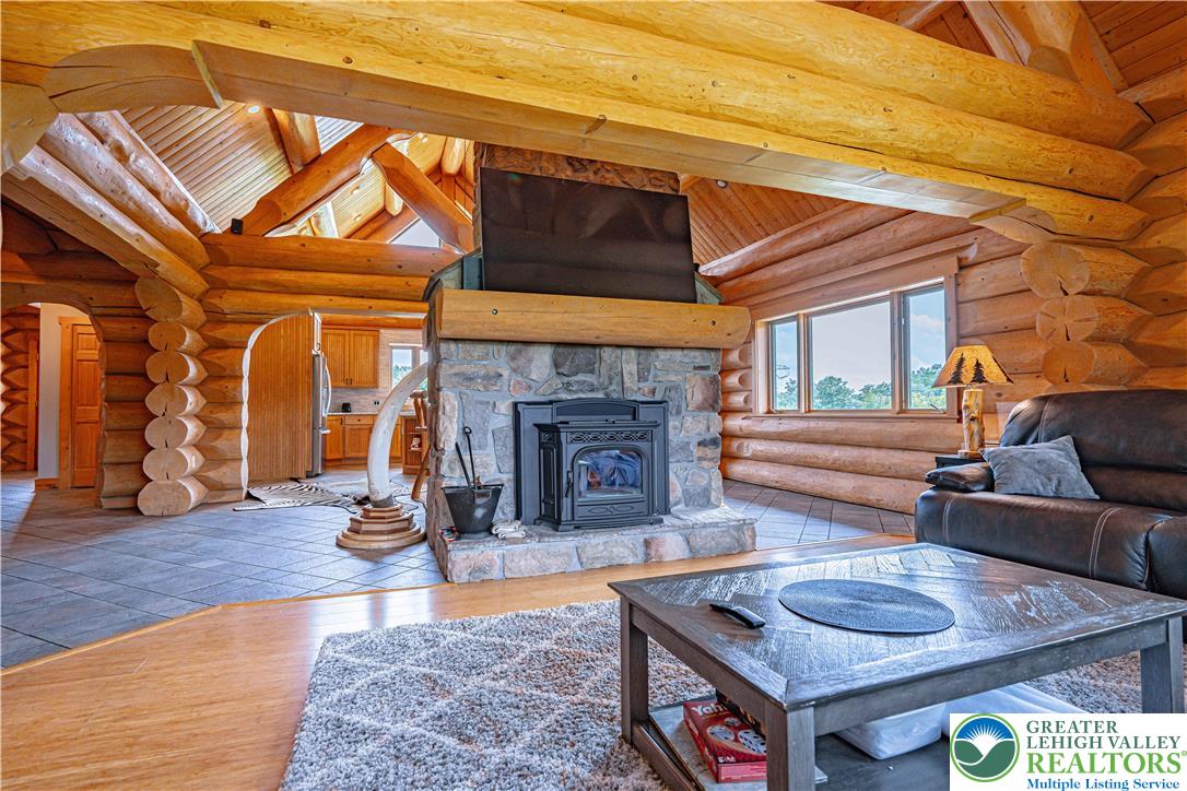 379 Meyer Road Nazareth, PA 18064 - Photo 25 of 78 a living room with furniture and a fireplace