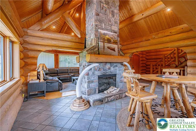 a bedroom with a bed and a baby crib