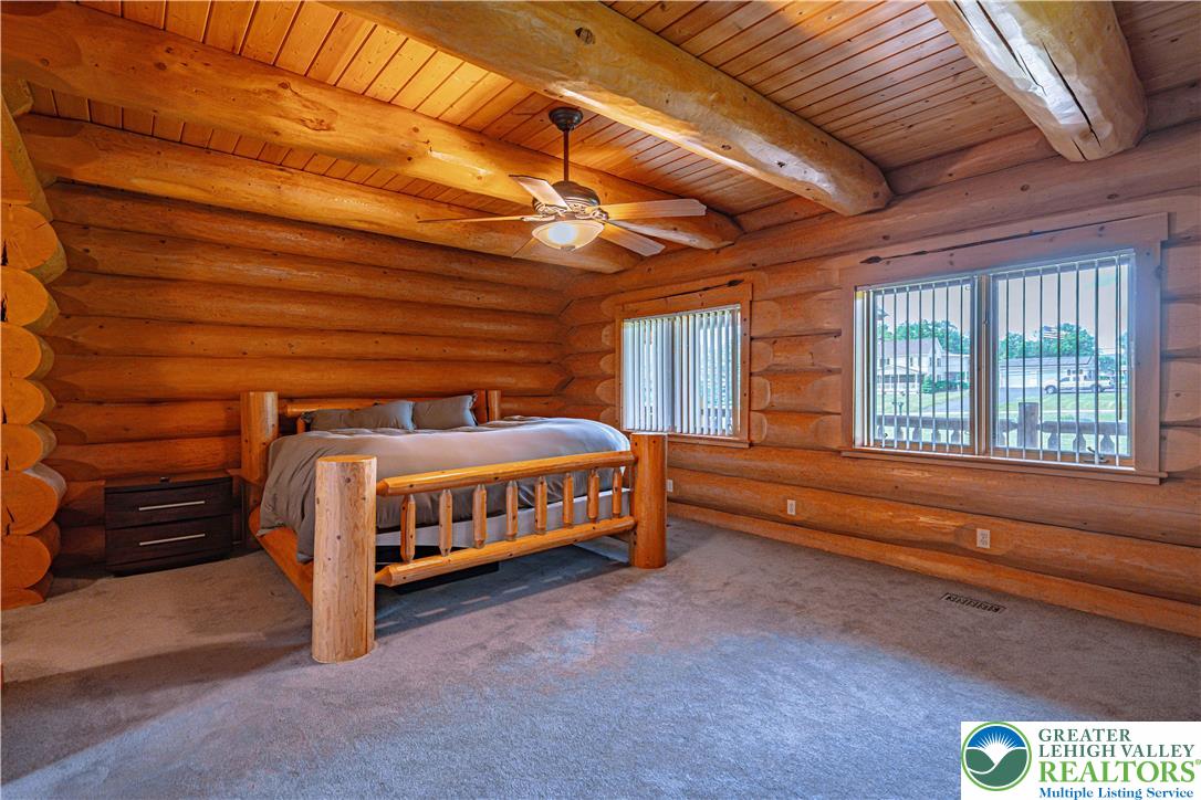 379 Meyer Road Nazareth, PA 18064 - Photo 46 of 78 a bedroom with a bed and a baby crib