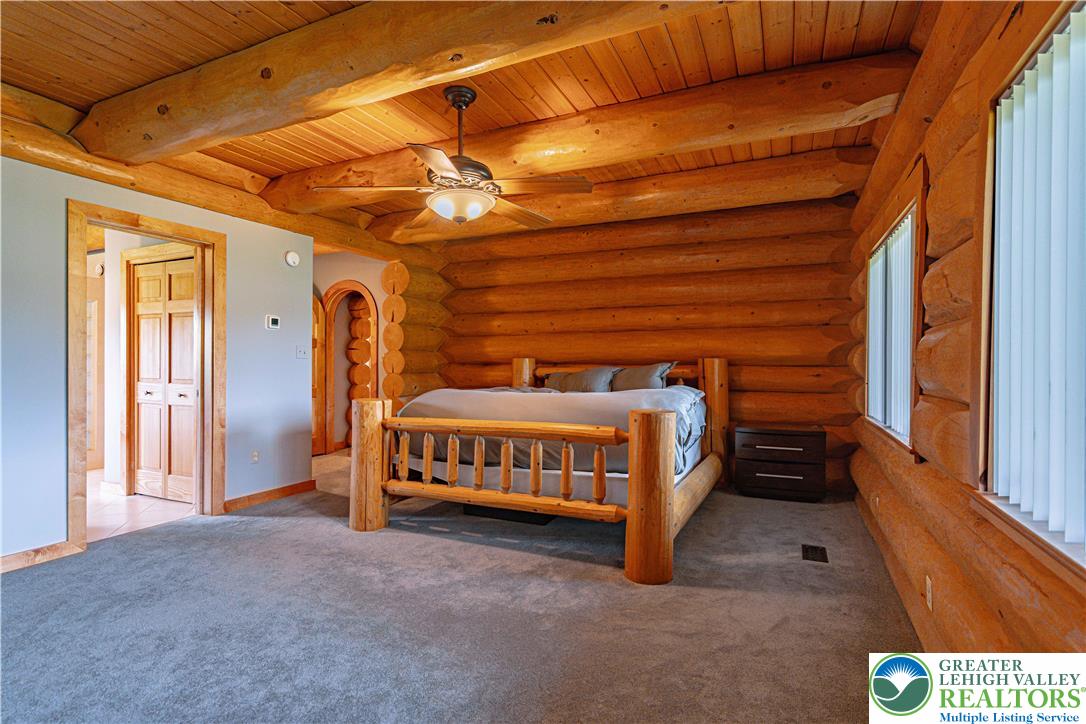 379 Meyer Road Nazareth, PA 18064 - Photo 47 of 78 a bedroom with a bed and a window