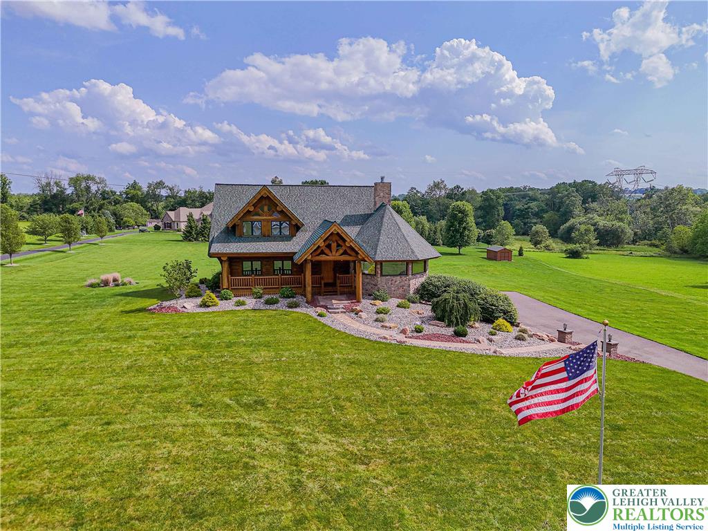 379 Meyer Road Nazareth, PA 18064 - Photo 5 of 78 a view of a house with a big yard and garden