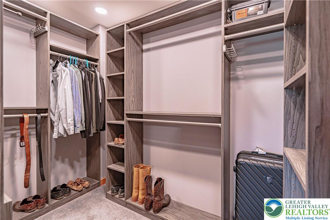 379 Meyer Road Nazareth, PA 18064 - Photo 53 of 78 a view of walk in closet with clothes and shoes