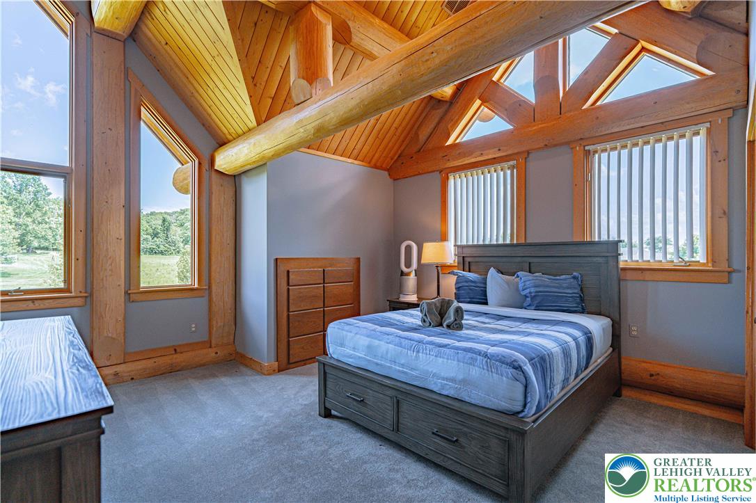 379 Meyer Road Nazareth, PA 18064 - Photo 63 of 78 a bedroom with a bed next to a window