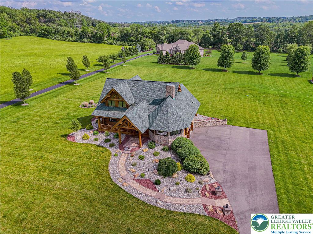 379 Meyer Road Nazareth, PA 18064 - Photo 8 of 78 an aerial view of a house with outdoor space swimming pool outdoor seating and yard