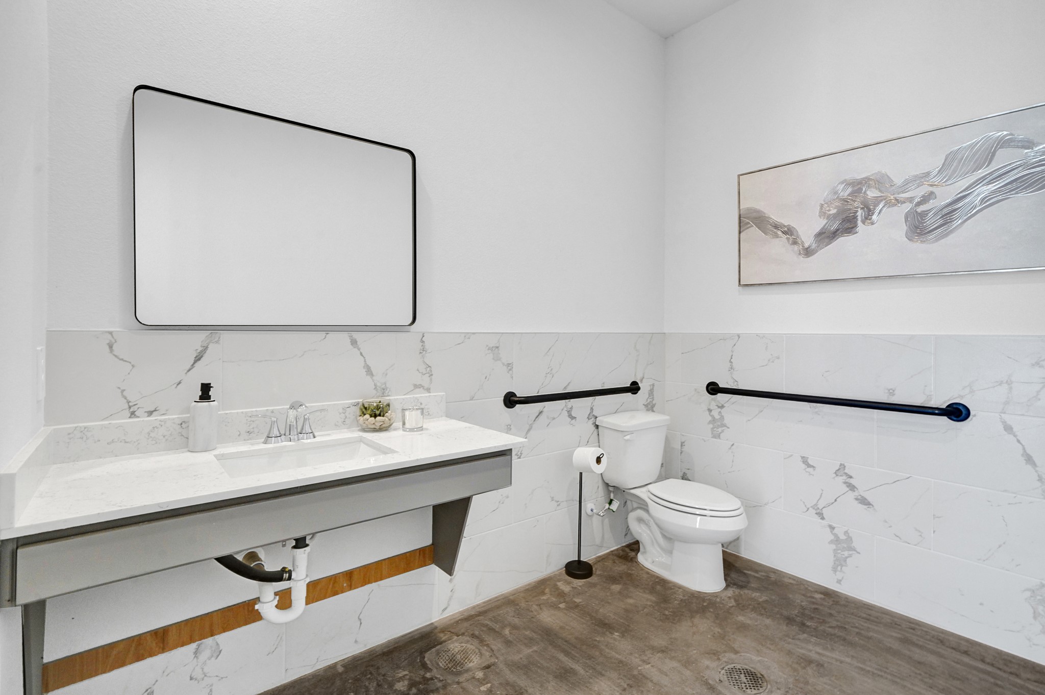 38634 Spur 149 Road, Unit 68A Magnolia, TX 77354 - Photo 36 of 50 a bathroom with a toilet sink and mirror