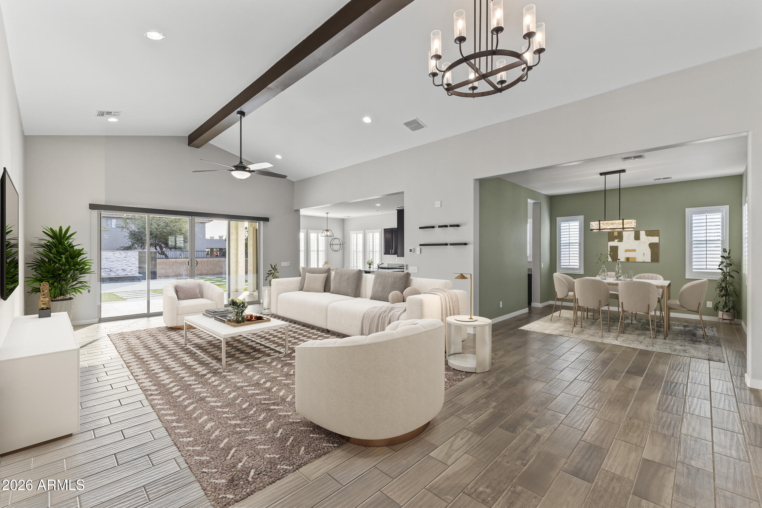 5255 North Ginning Road Litchfield Park, AZ 85340 - Photo 13 of 60 a living room with fireplace furniture and a large window
