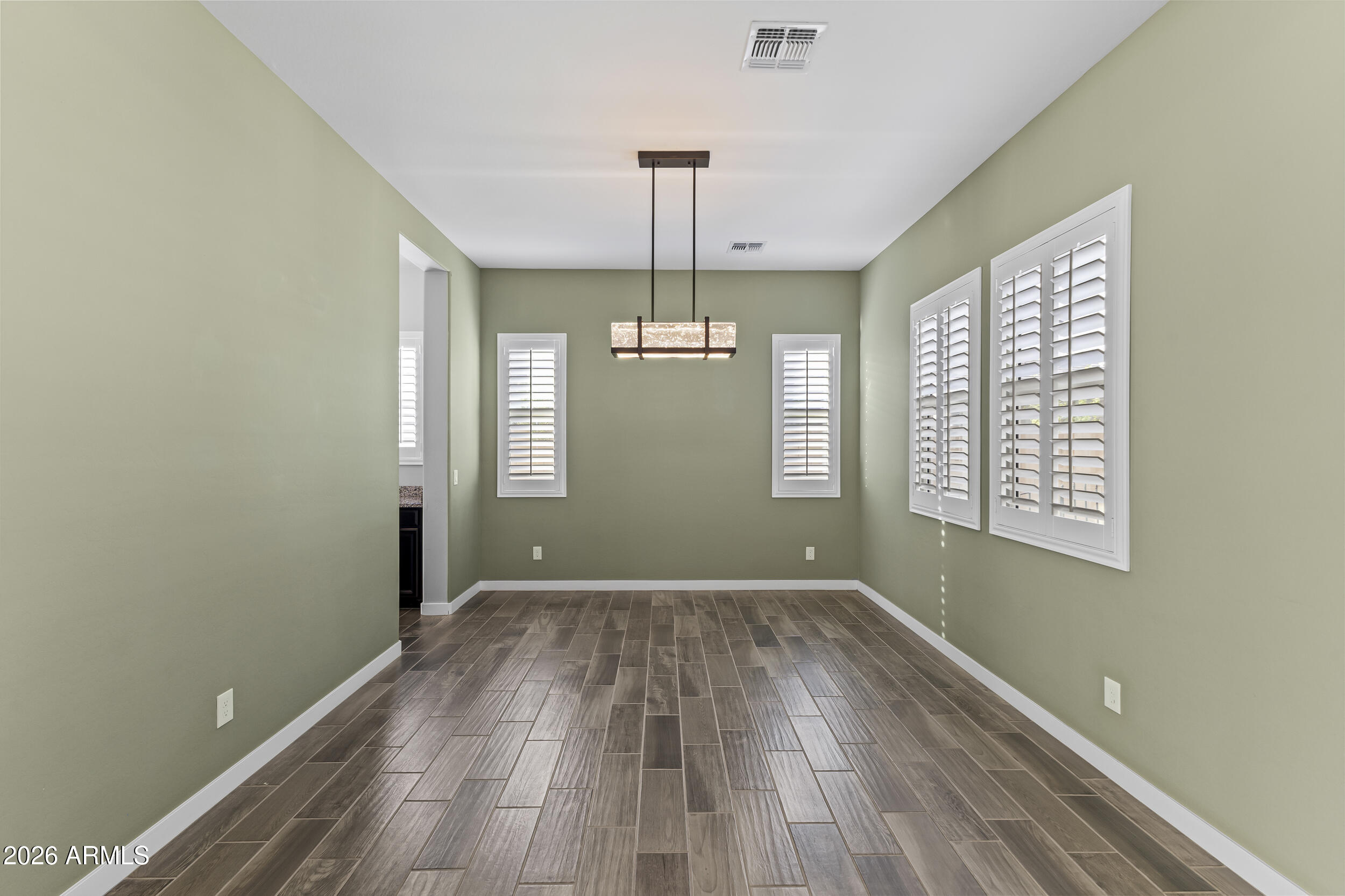 5255 North Ginning Road Litchfield Park, AZ 85340 - Photo 16 of 60 a view of an empty room with a window