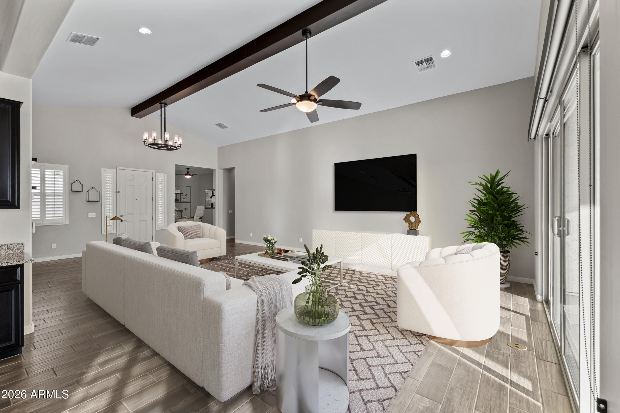 5255 North Ginning Road Litchfield Park, AZ 85340 - Photo 18 of 60 a living room with furniture and a flat screen tv
