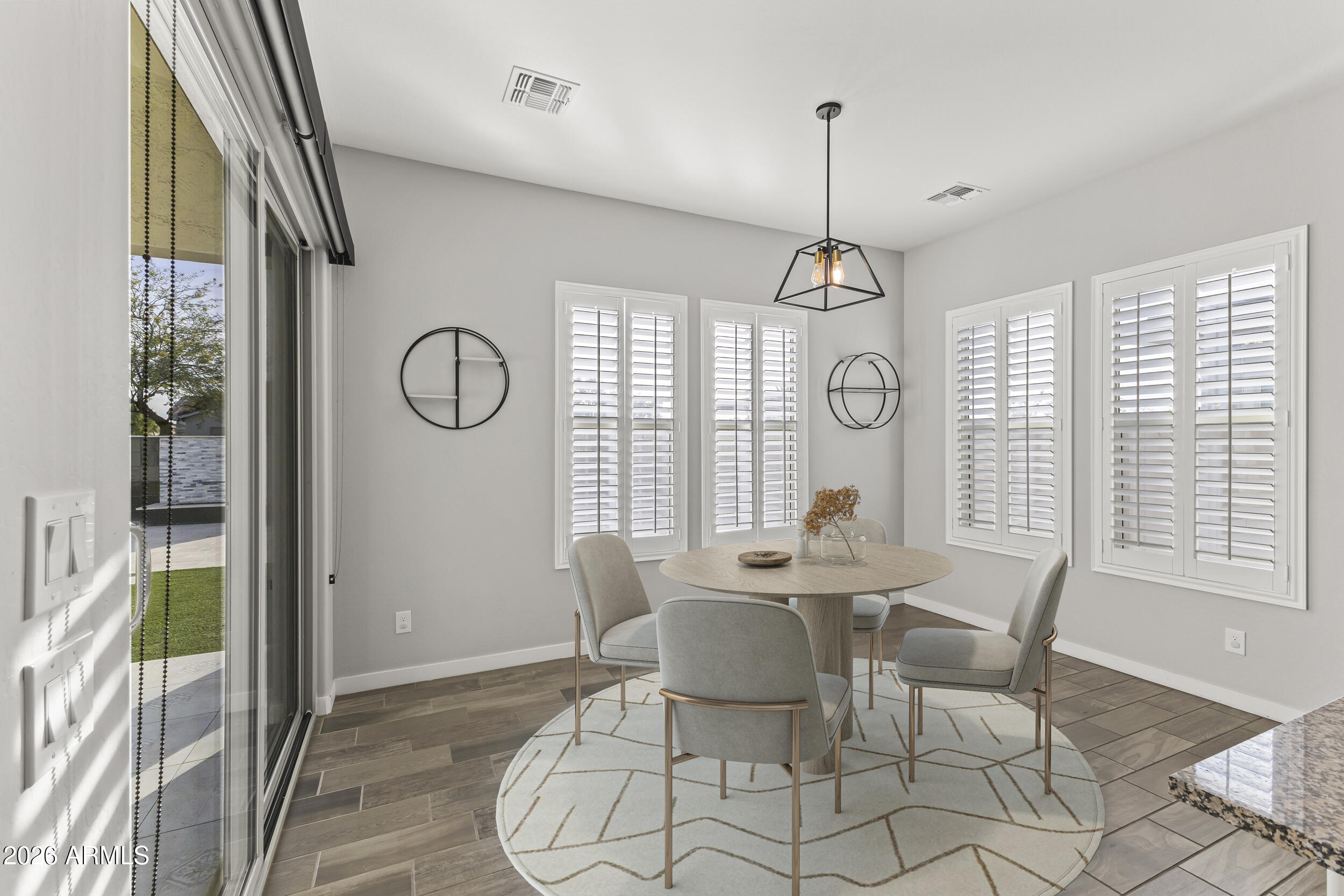5255 North Ginning Road Litchfield Park, AZ 85340 - Photo 24 of 60 a view of a dining room with furniture window and outside view