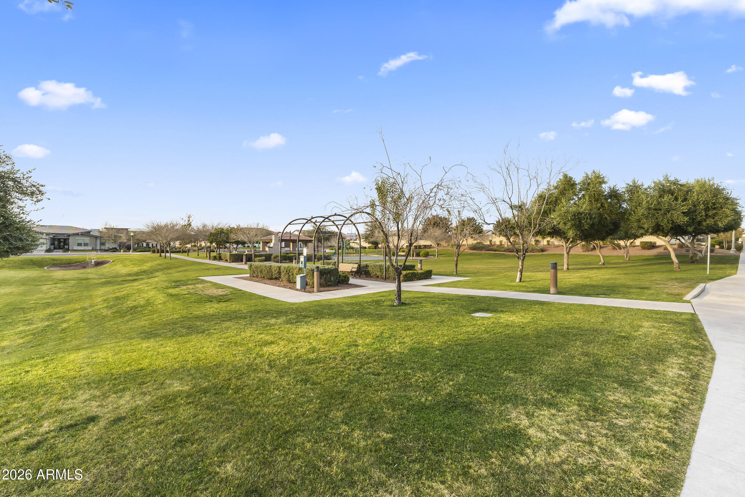 5255 North Ginning Road Litchfield Park, AZ 85340 - Photo 56 of 60 a view of a golf course with a lake