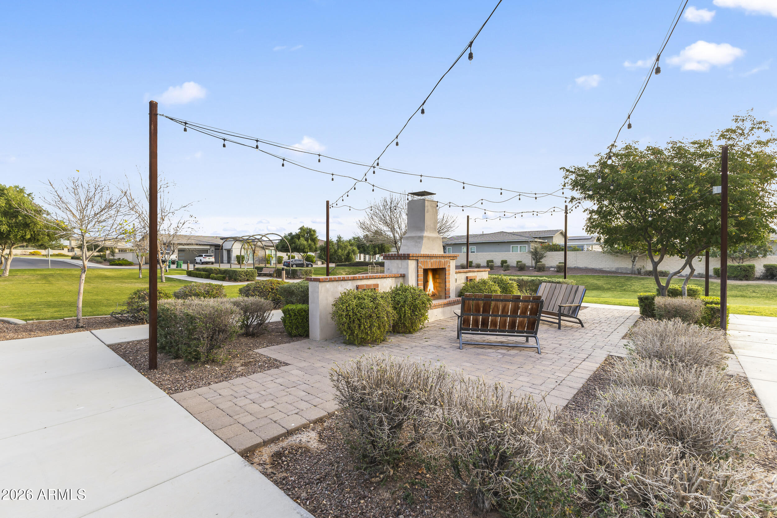 5255 North Ginning Road Litchfield Park, AZ 85340 - Photo 57 of 60 a view of a swimming pool and outdoor seating