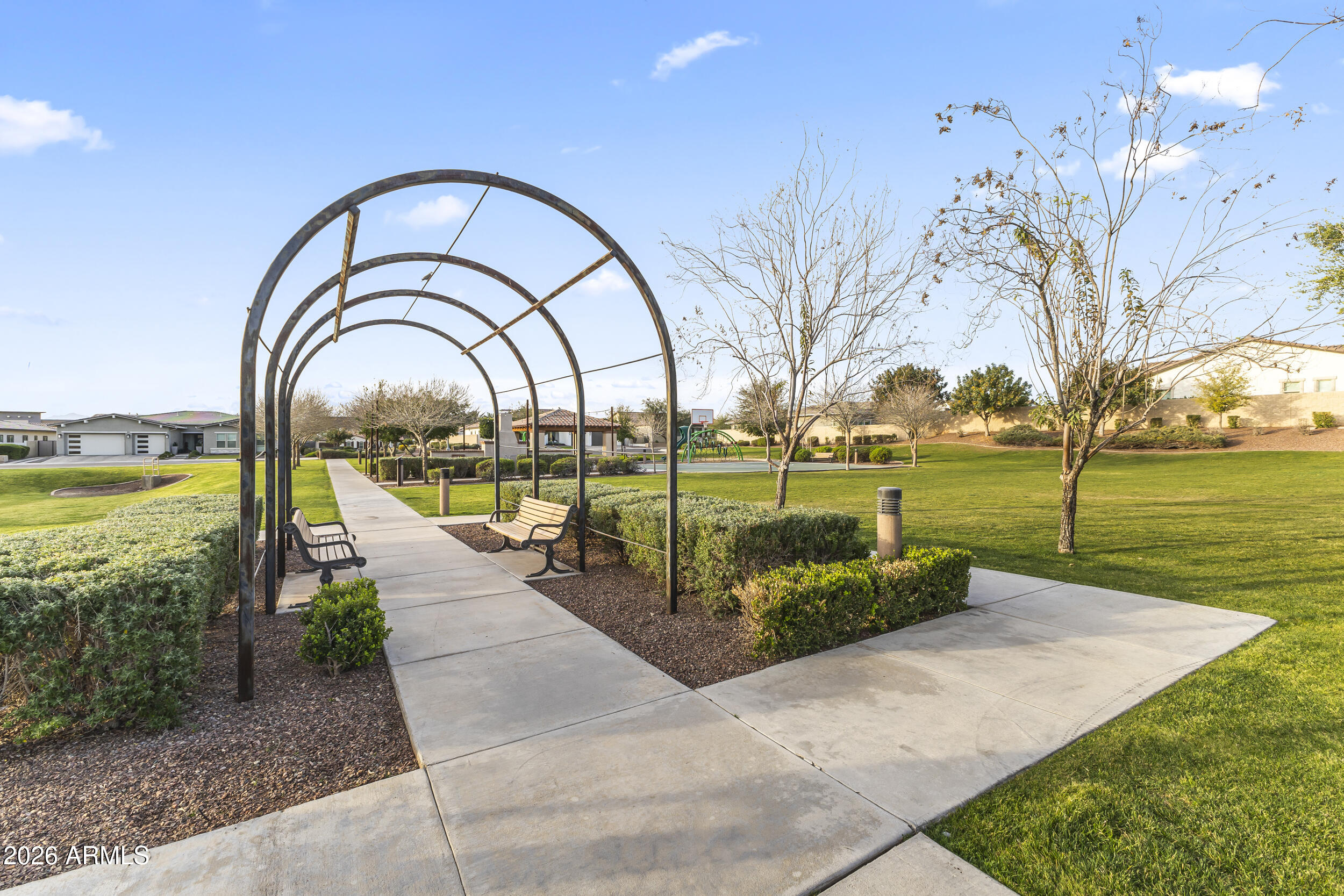 5255 North Ginning Road Litchfield Park, AZ 85340 - Photo 58 of 60 a view of swimming pool with outdoor space and seating area