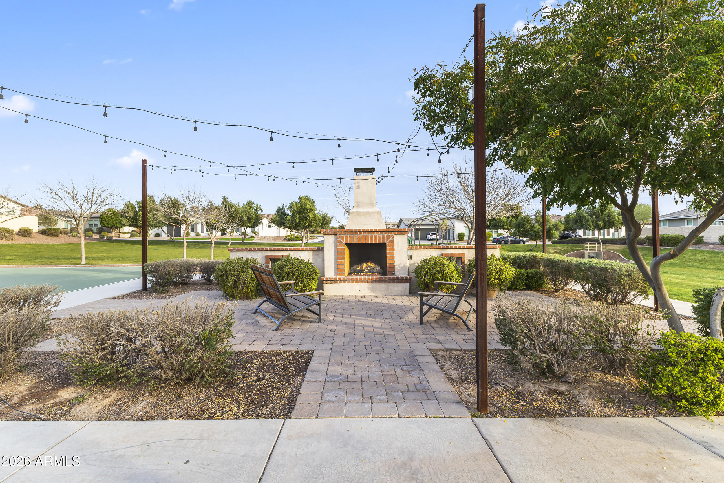 5255 North Ginning Road Litchfield Park, AZ 85340 - Photo 59 of 60 a view of a porch with furniture and garden