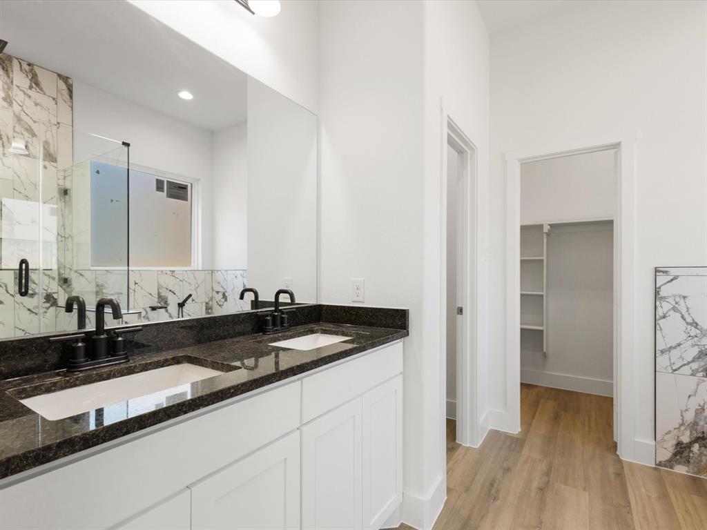 111 West Farmers Road Seagoville, TX 75159 - Photo 13 of 32 a close view of a sink and a mirror