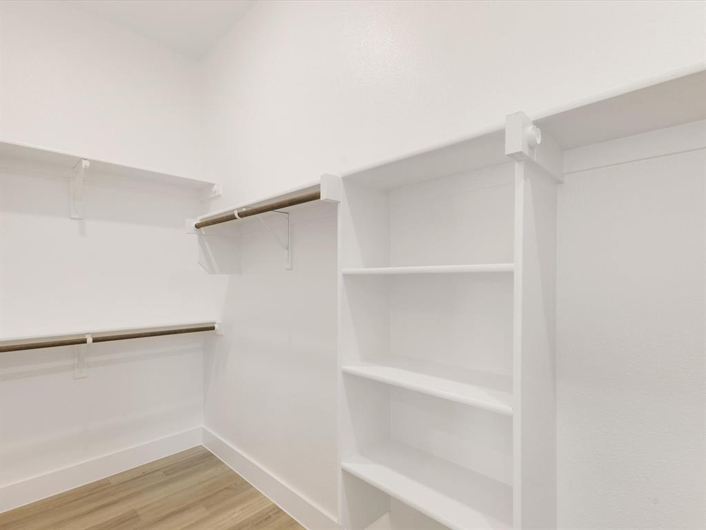 111 West Farmers Road Seagoville, TX 75159 - Photo 15 of 32 a view of an empty walk in closet