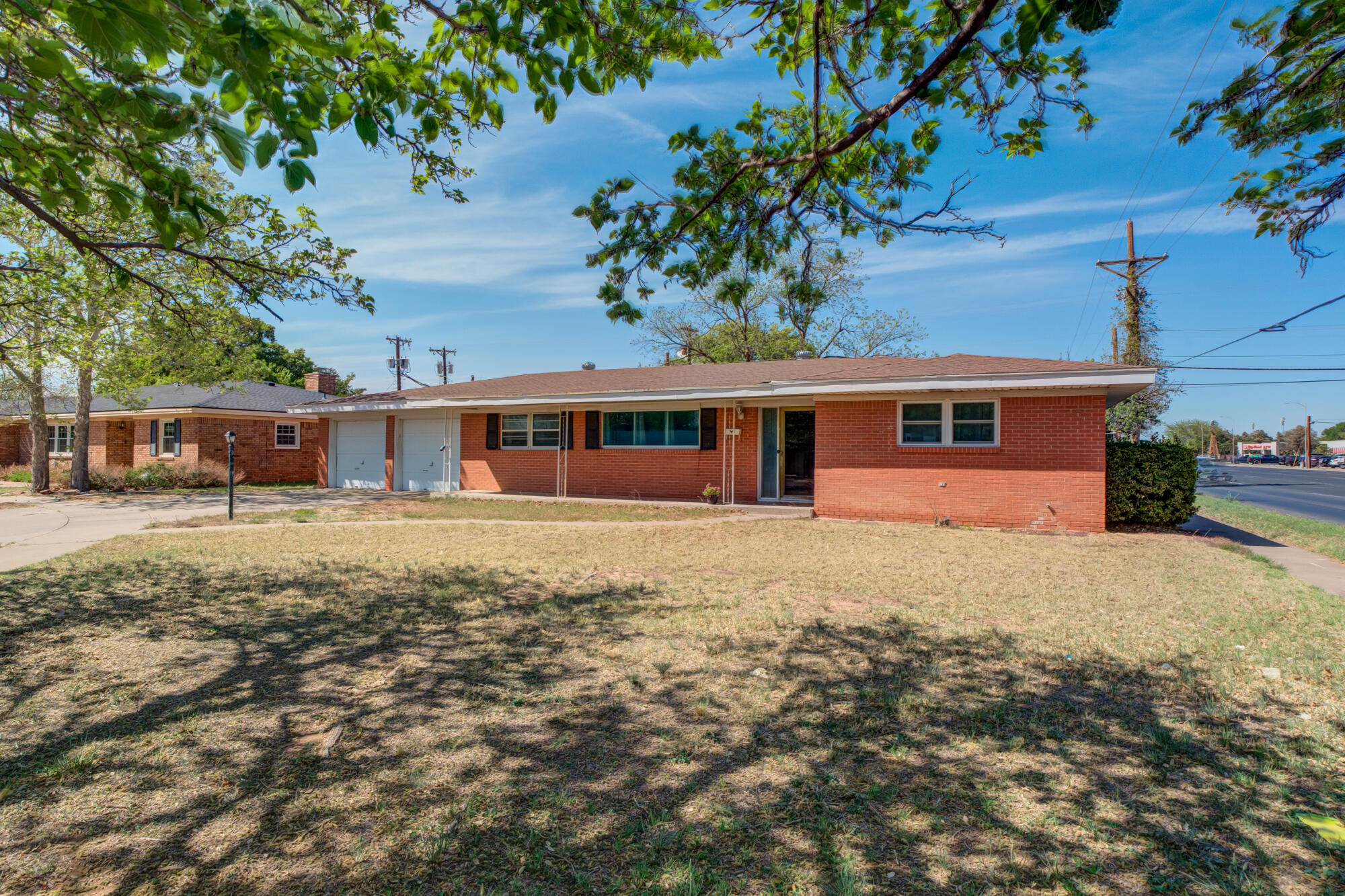 3402 53rd Street Lubbock, TX 79413 - Photo 7 of 39 3402-53rd-St_Lubbock-TX_3_Front-Exterior