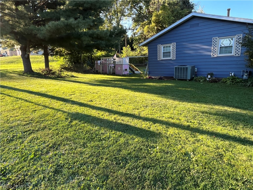 269 Diane Street Rittman, OH 44270 - Photo 12 of 13 View of yard with central AC