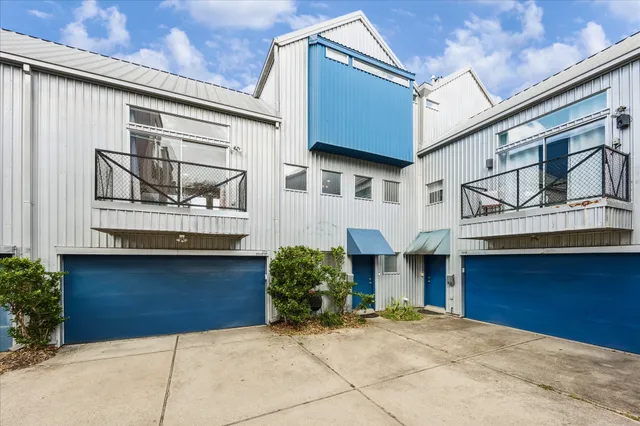 a view of a house with a garage