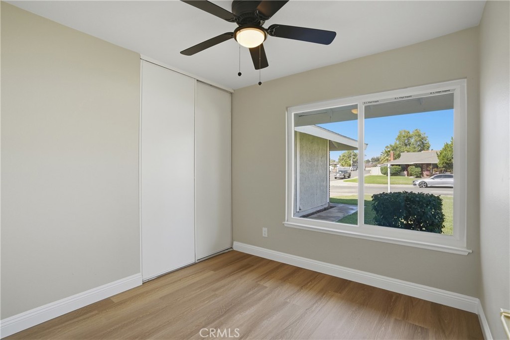 2924 Louisiana Place Riverside, CA 92506 - Photo 28 of 42 a view of an empty room with a window and wooden floor