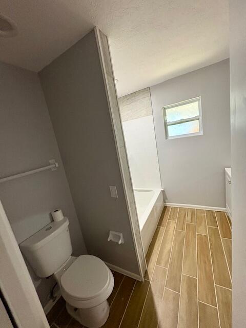 1142 Southwest Bayamo Avenue Port St. Lucie, FL 34953 - Photo 15 of 19 a bathroom with a toilet and a shower