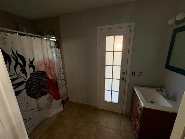 1142 Southwest Bayamo Avenue Port St. Lucie, FL 34953 - Photo 19 of 19 a view of walk in closet with window