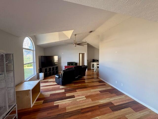 1142 Southwest Bayamo Avenue Port St. Lucie, FL 34953 - Photo 4 of 19 a living room with furniture and a flat screen tv