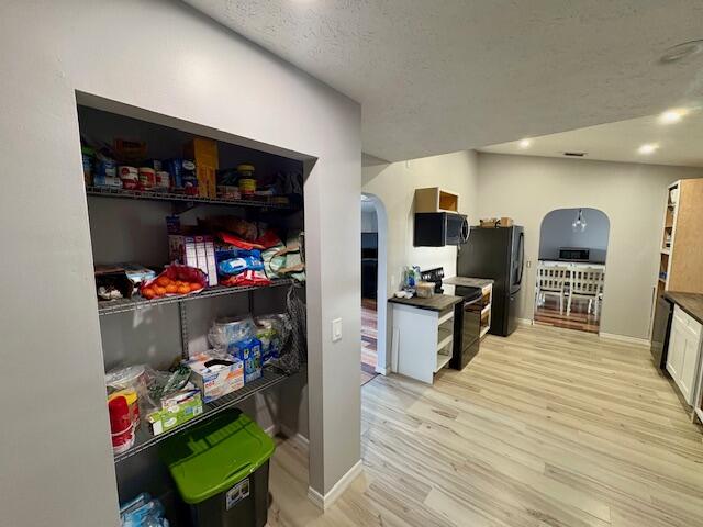 1142 Southwest Bayamo Avenue Port St. Lucie, FL 34953 - Photo 10 of 19 a view of a workspace with furniture