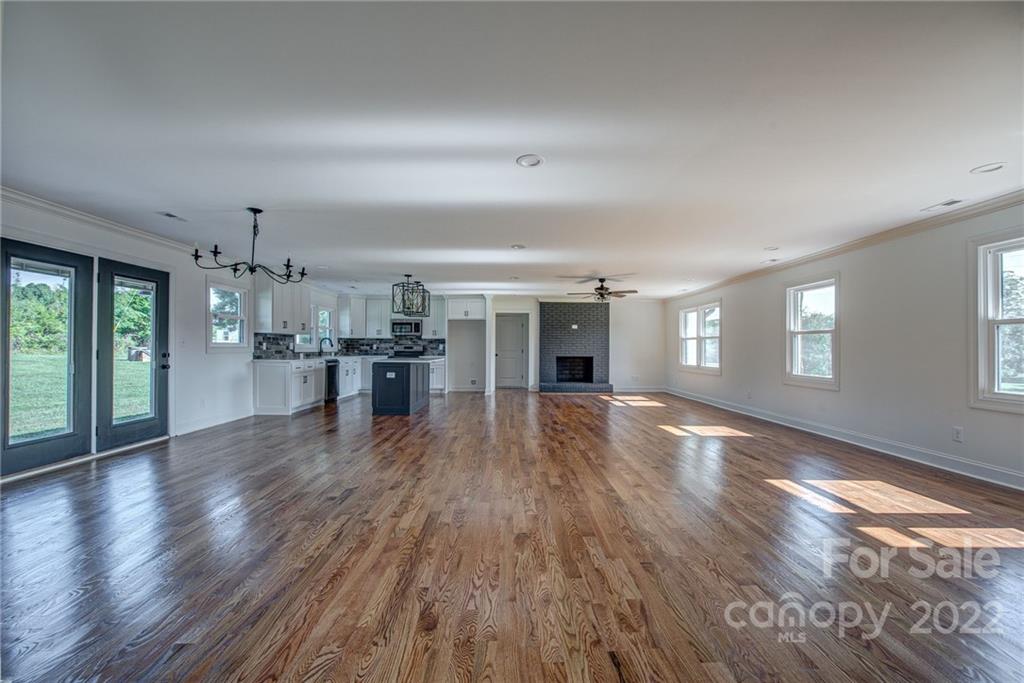 649 Loray Farm Road Dallas, NC 28034 - Photo 23 of 44 wooden floor in an empty room with a window