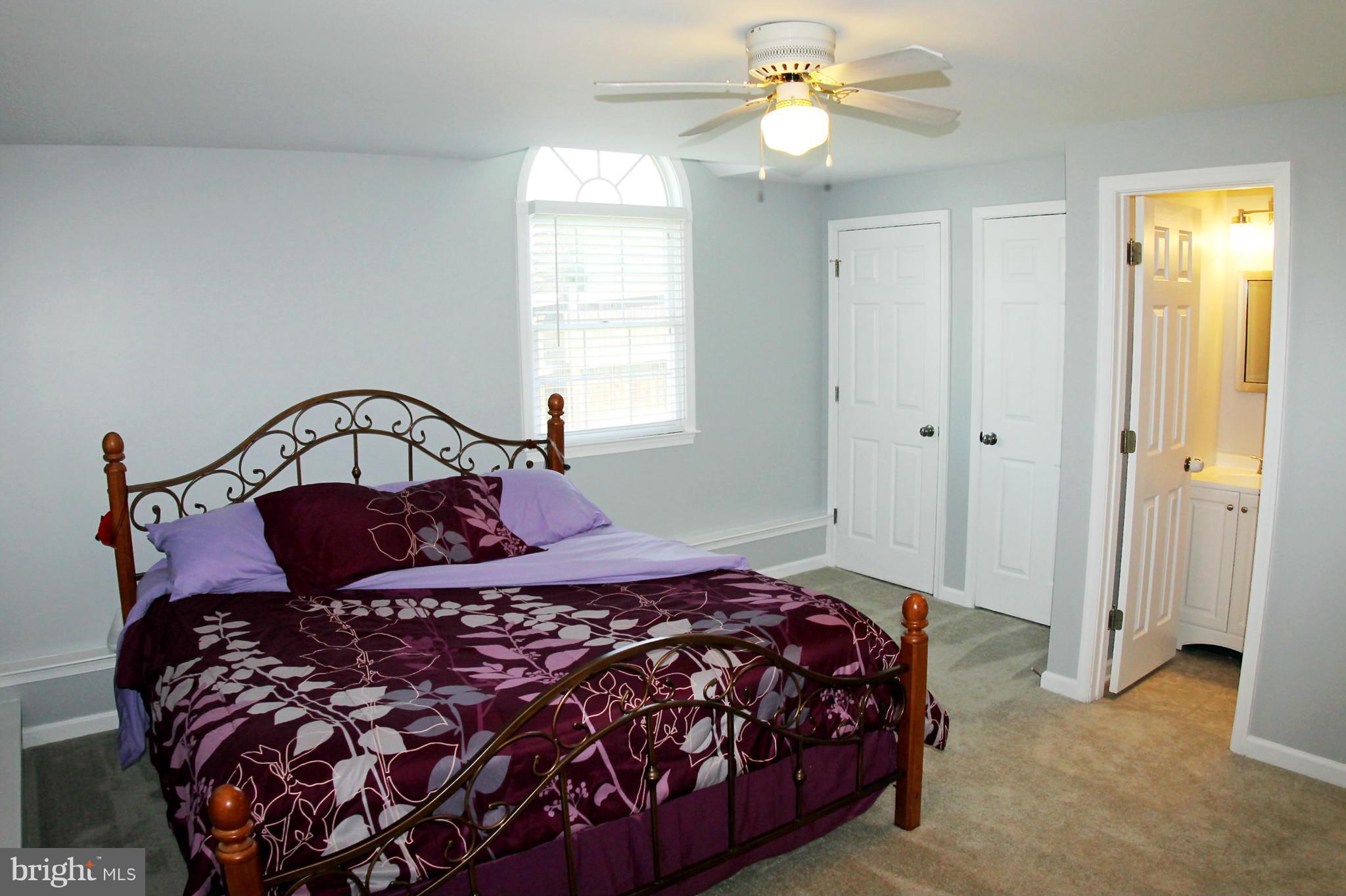 26722 Ridge Road Damascus, MD 20872 - Photo 15 of 30 a bedroom with a bed and window