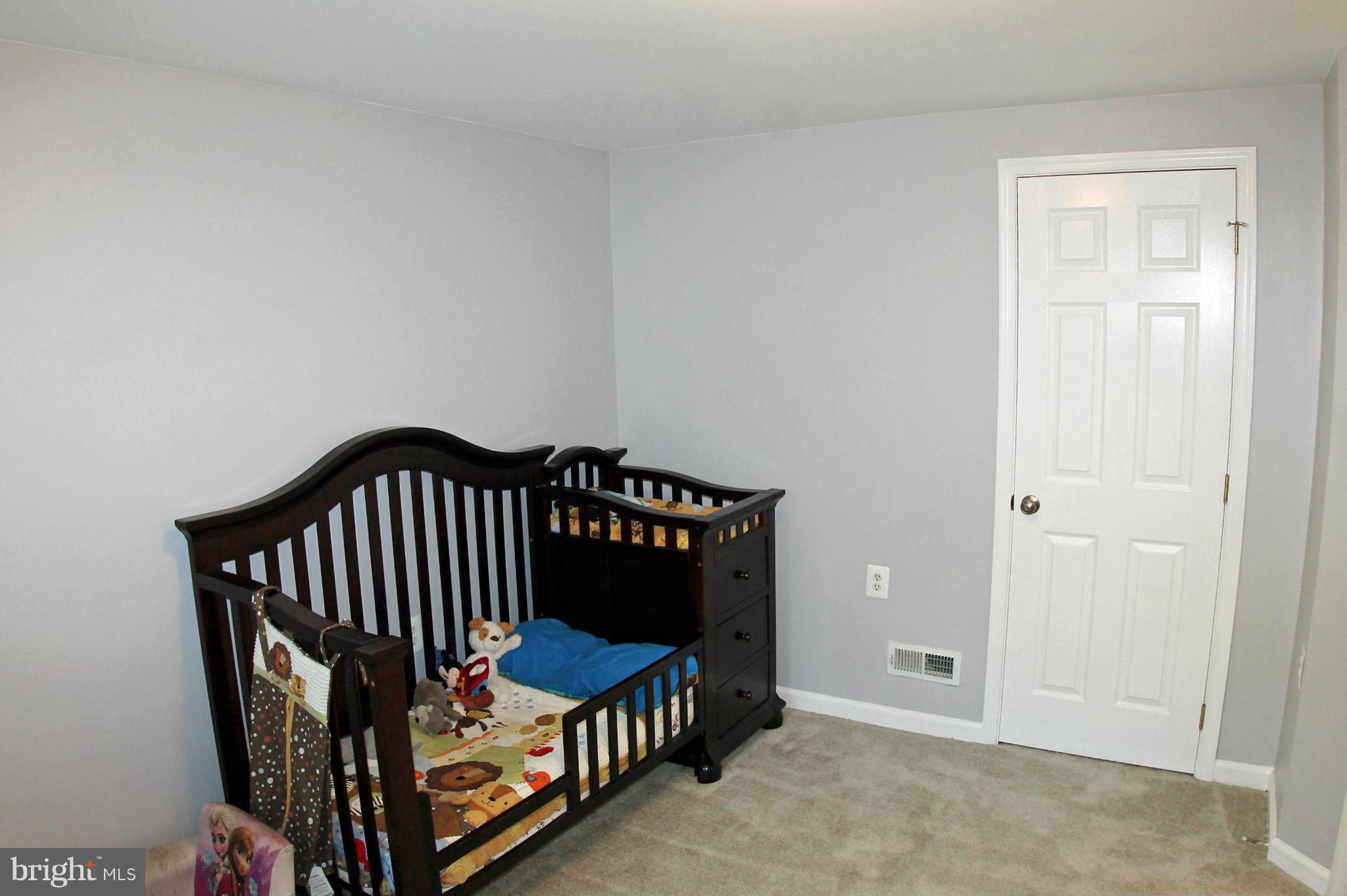 26722 Ridge Road Damascus, MD 20872 - Photo 21 of 30 a view of a bedroom with wooden fence