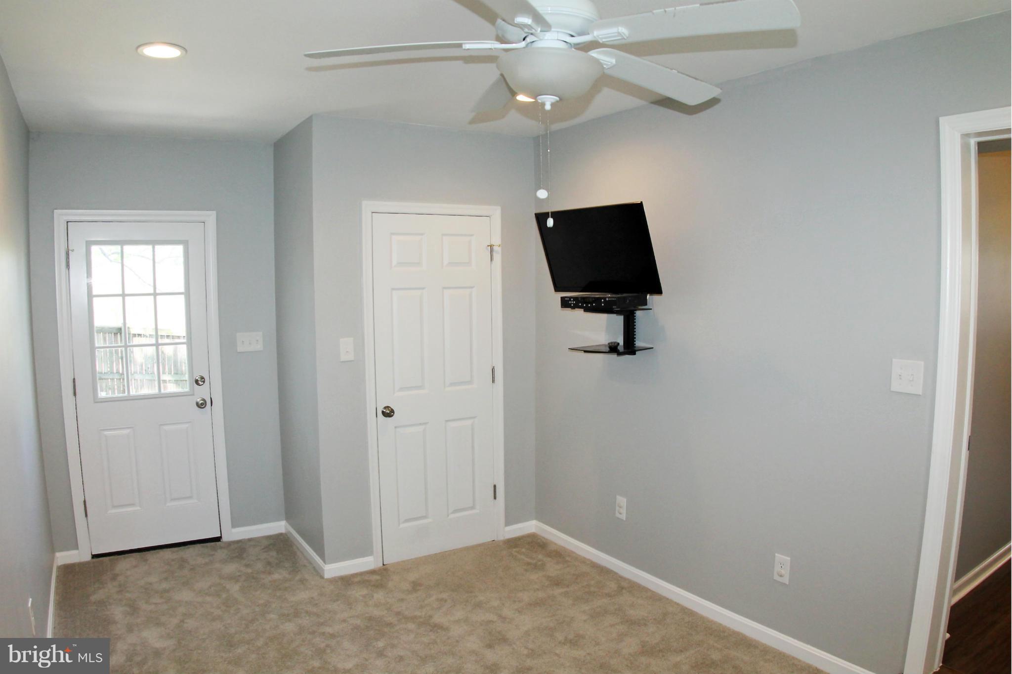 26722 Ridge Road Damascus, MD 20872 - Photo 25 of 30 wooden floor in an empty room with a window