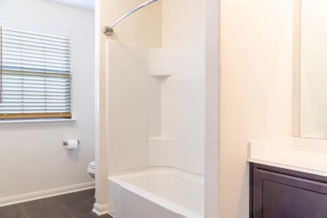 a bathroom with a bathtub
