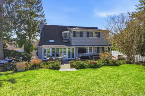a view of a house with a garden